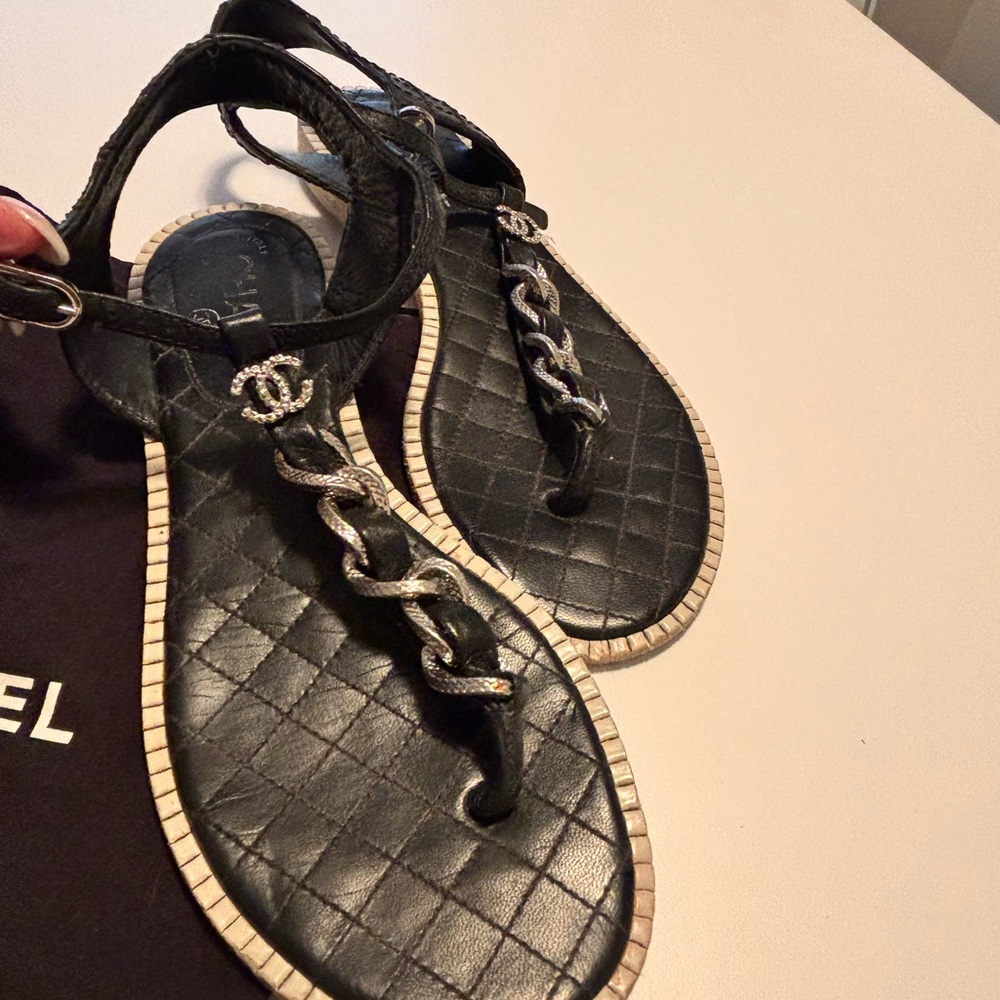 CHANEL Black Quilted Sandals with Silver Chain Accent